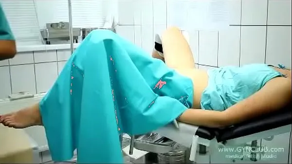 Fresh beautiful girl on a gynecological chair (33 top Tube