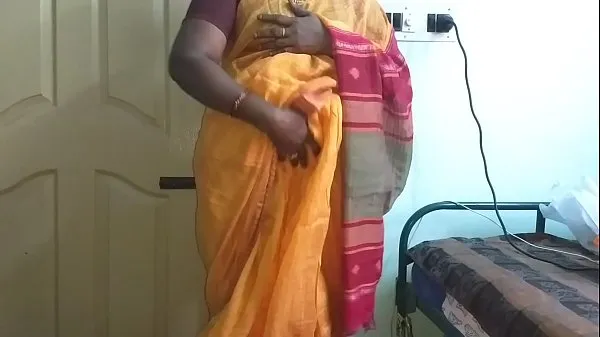 Nuovo desi indiano cornea tamil telugu kannada malayalam hindi tradire moglie vanitha indossare saree color arancio mostrando grandi tette e figa rasata premere tette dure premere nip sfregamento figa masturbazione tubo superiore