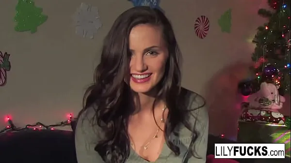 Fresh Lily tells us her horny Christmas wishes before satisfying herself in both holes top Tube